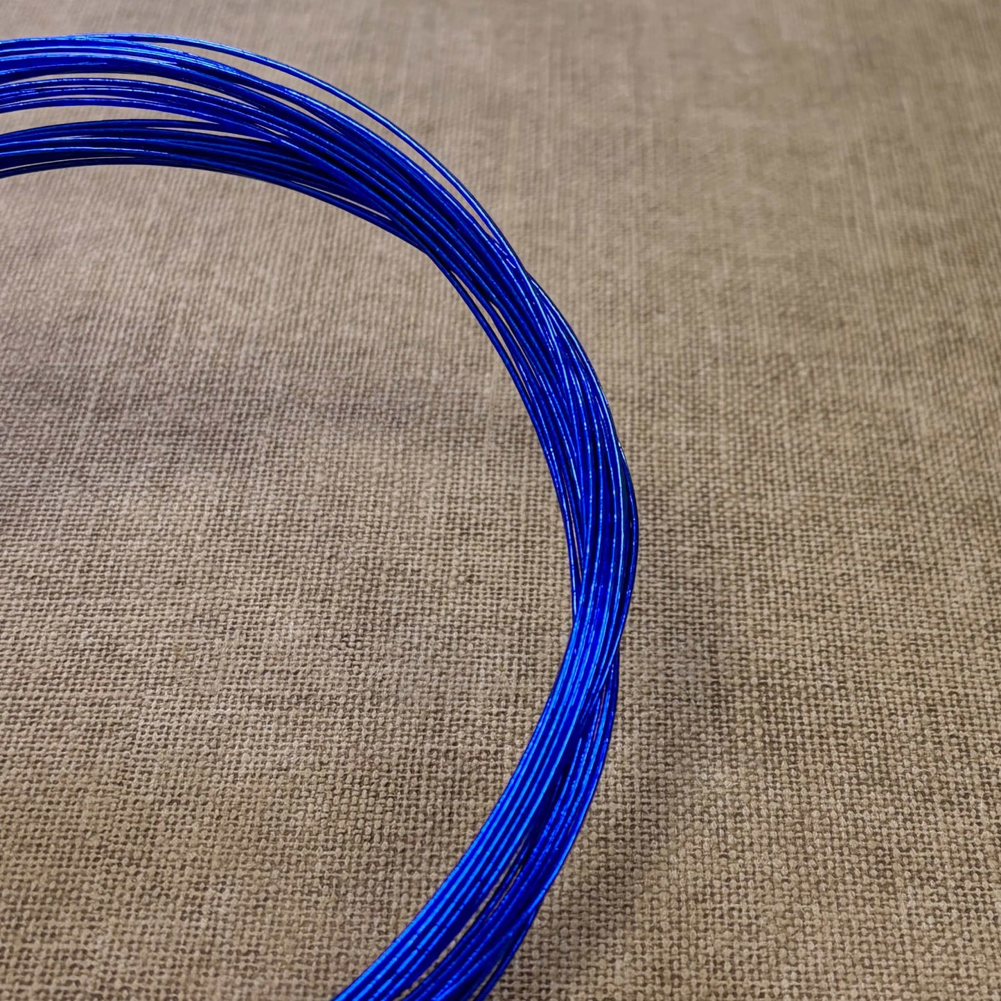 Foil wrapped mizuhiki cord, royal blue side detail view