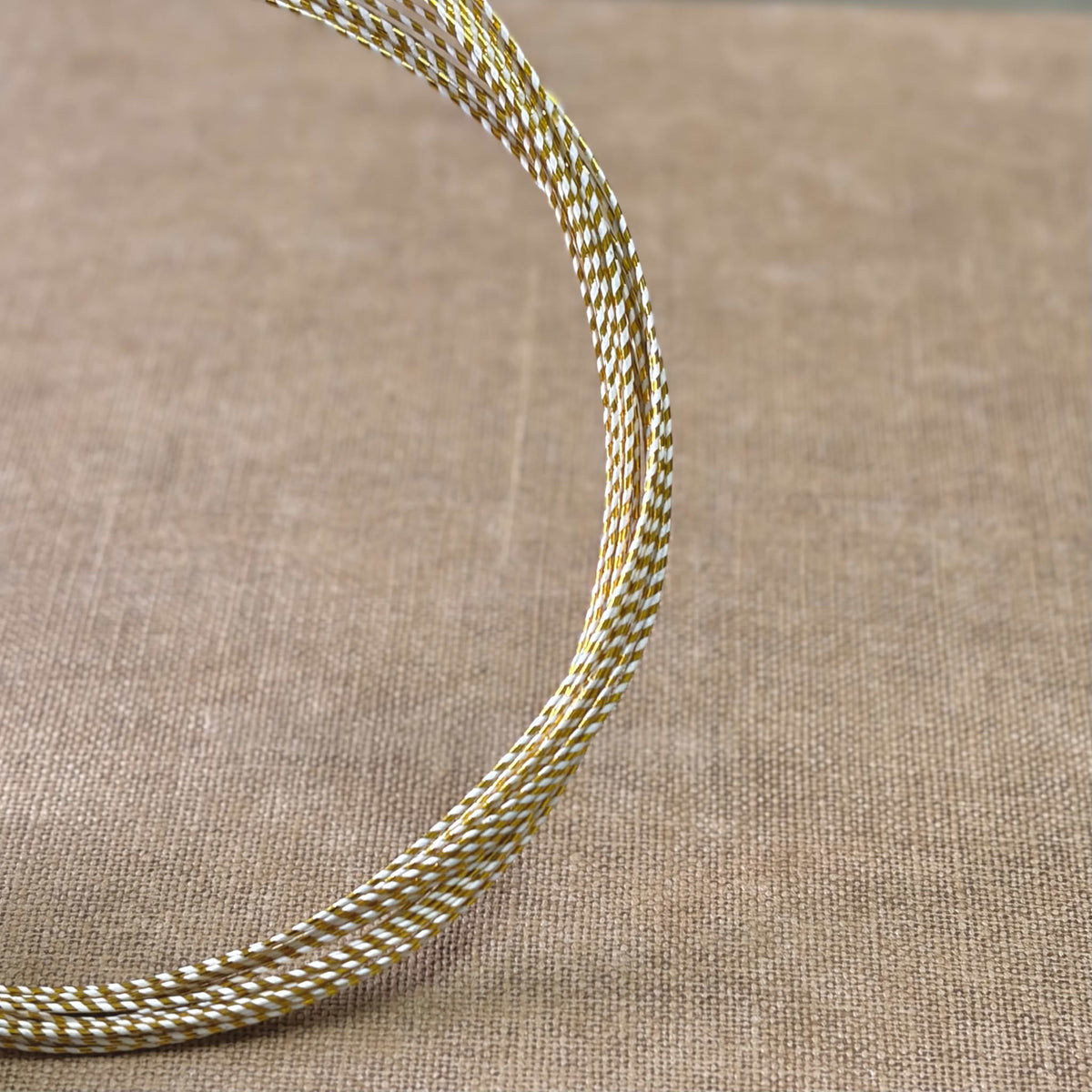 Spiral wrapped Japanese mizuhiki cord, gold spiral wrapped, image 3