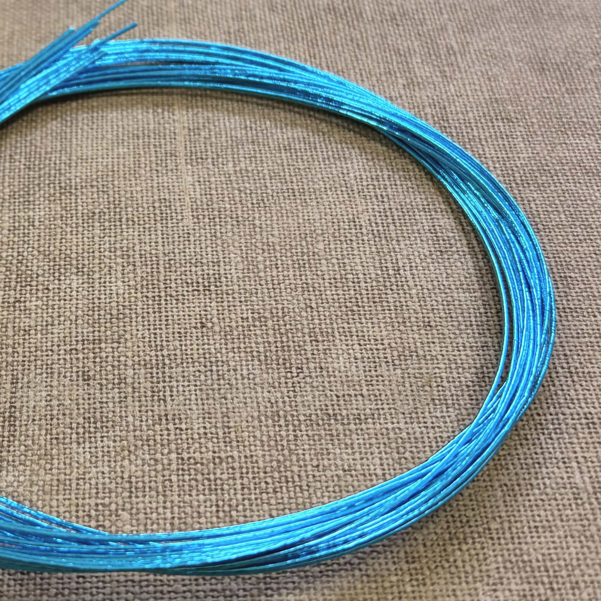 Foil wrapped mizuhiki cord, clear turquoise product view