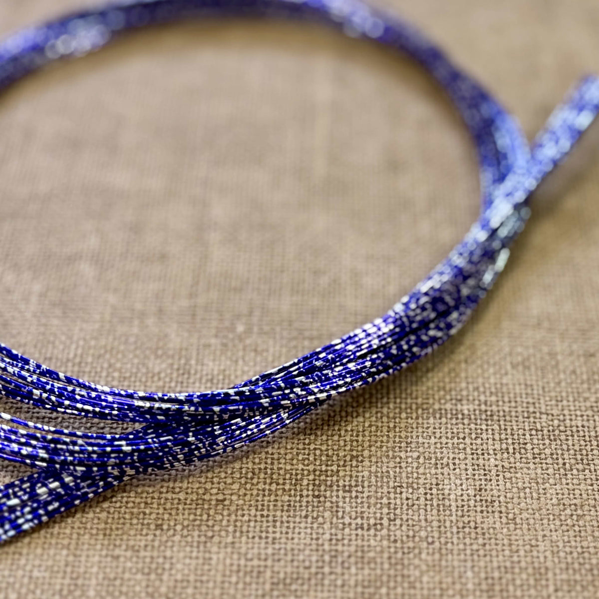 Foil wrapped mizuhiki cord, deep indigo detail view 2