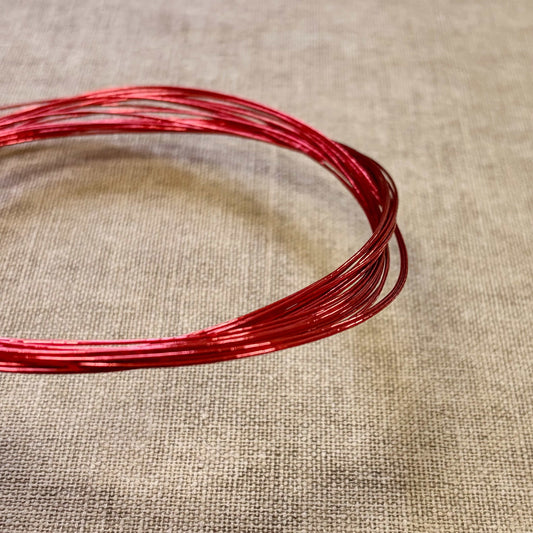 Foil wrapped mizuhiki cord, glossy crimson side detail view