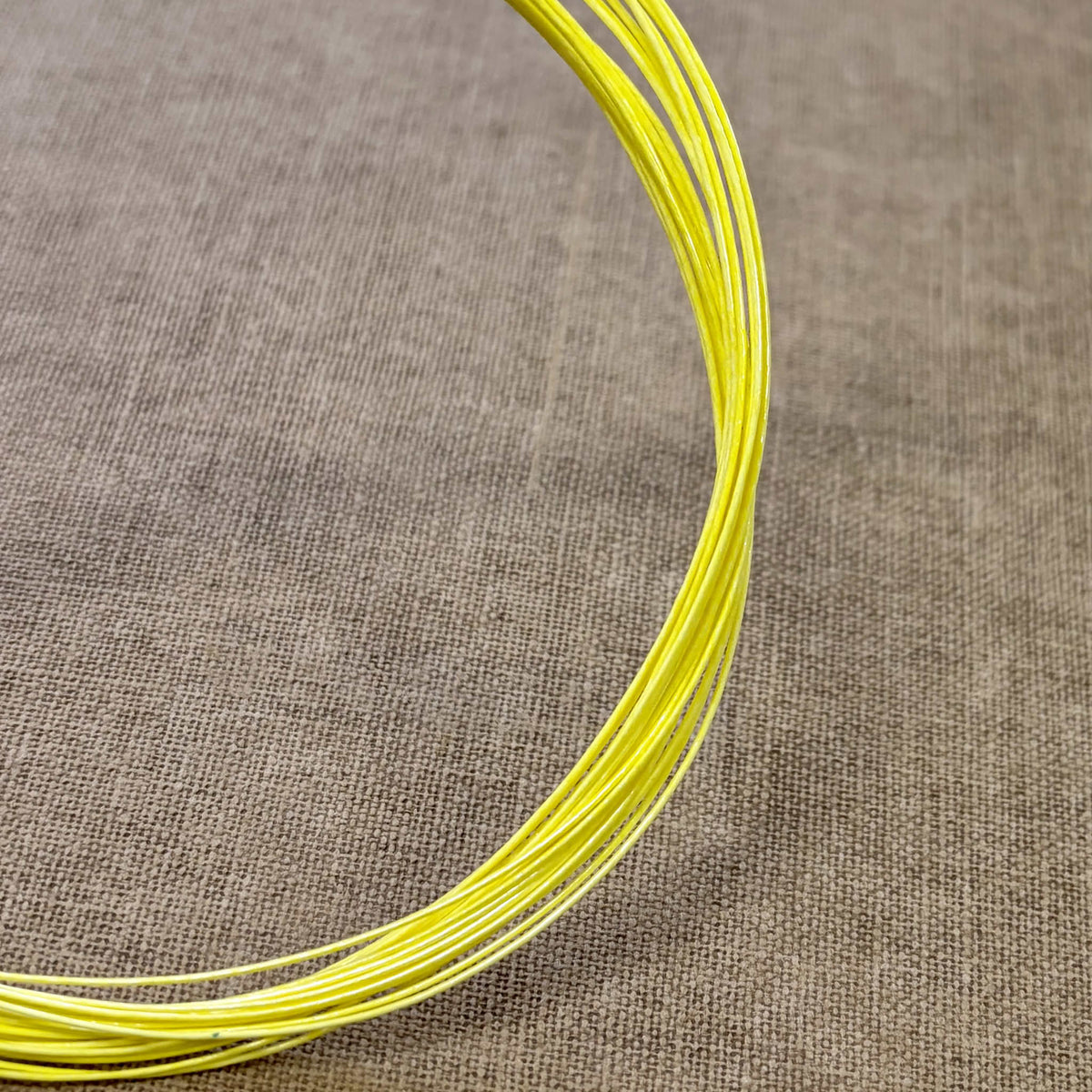 Foil wrapped mizuhiki cord, lemon yellow side detail view