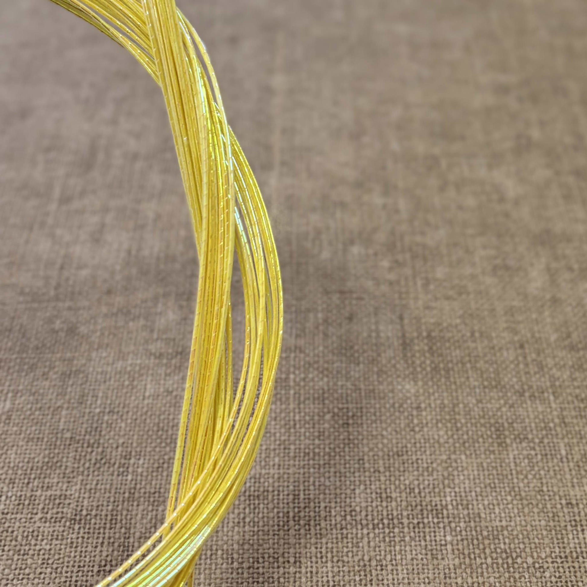 Foil wrapped mizuhiki cord, mermaid yellow side detail view
