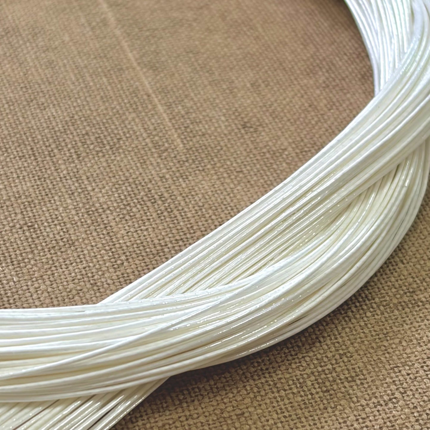 Foil wrapped mizuhiki cord, pearl white side detail view